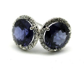 18kt white gold 3-prong martini sapphire and diamond halo studs.